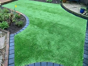 beautiful landscape design with fake grass